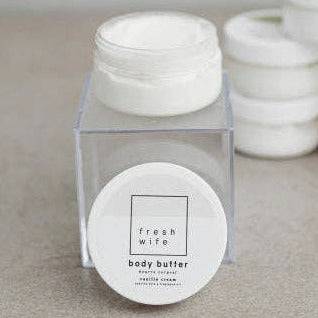 White body butter jars with &