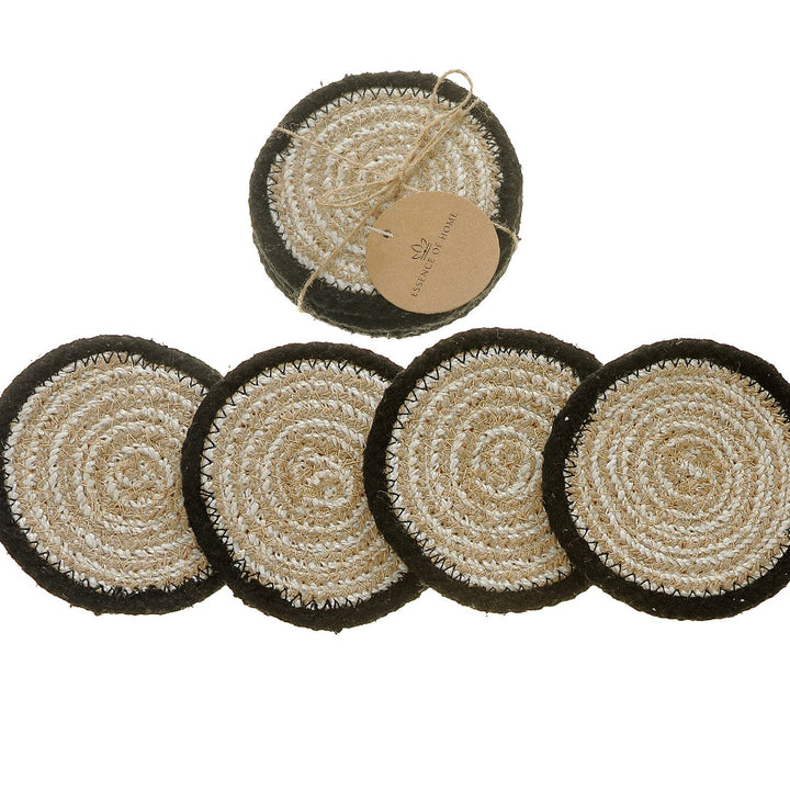 Set of round woven coasters with a central tag on a white background