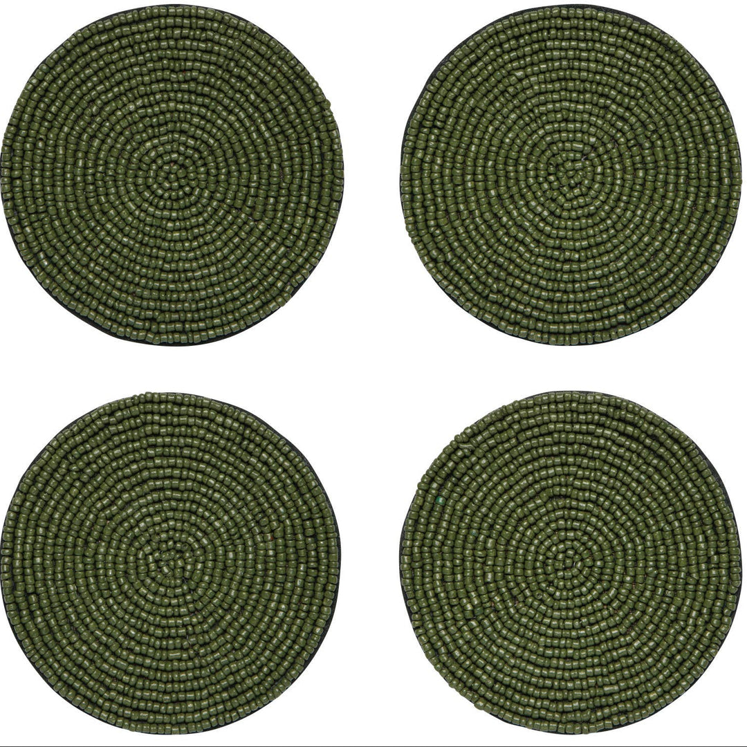 Four round woven placemats in a dark olive green color, arranged in a 2x2 grid on a solid white background.