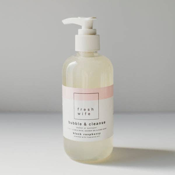A clear pump bottle with a pink label, labeled 'fresh wife Bubble & Cleanse' with the scent 'Black Raspberry'.