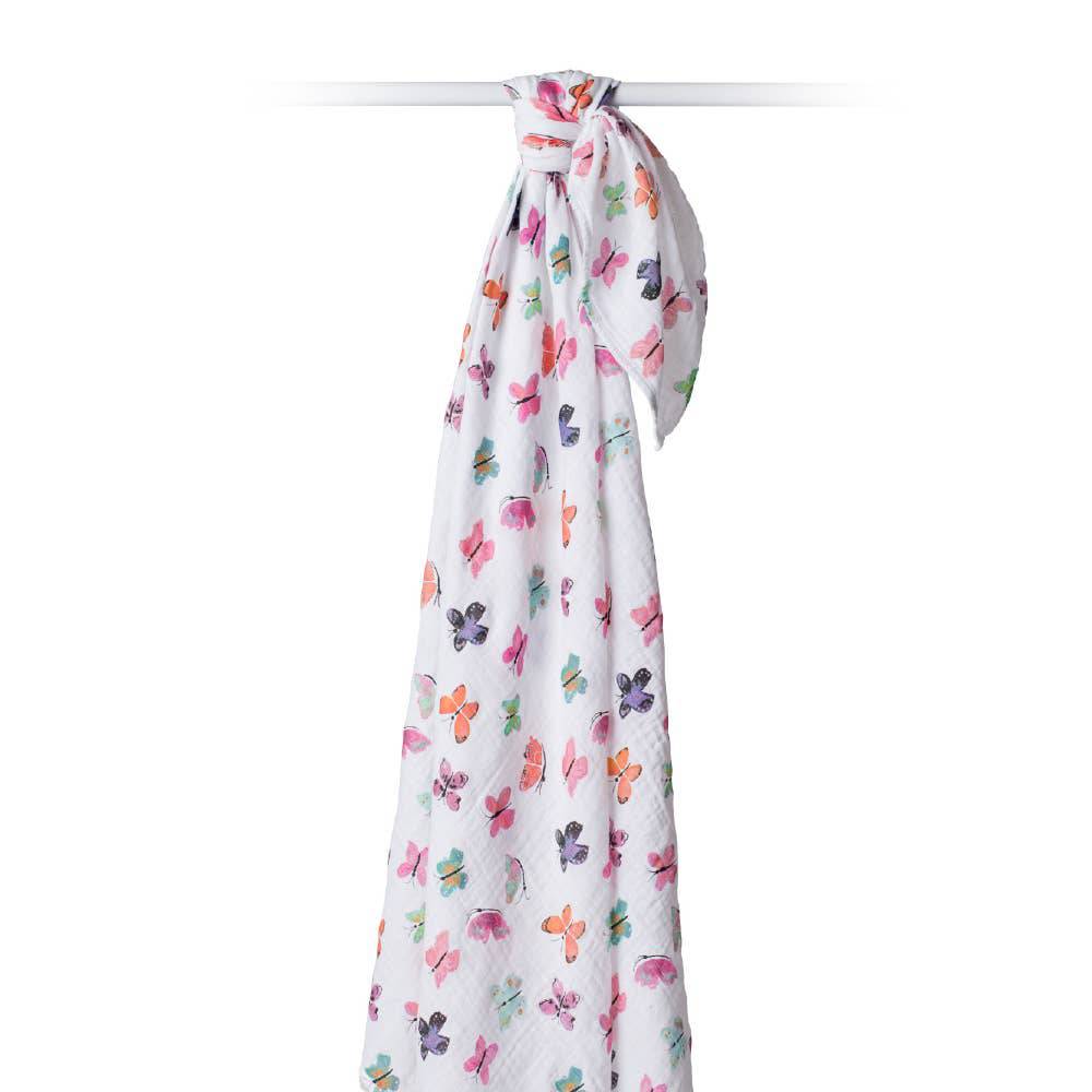 Lulujo Baby muslin swaddle blanket featuring a butterfly pattern, soft and breathable fabric for newborns and infants.