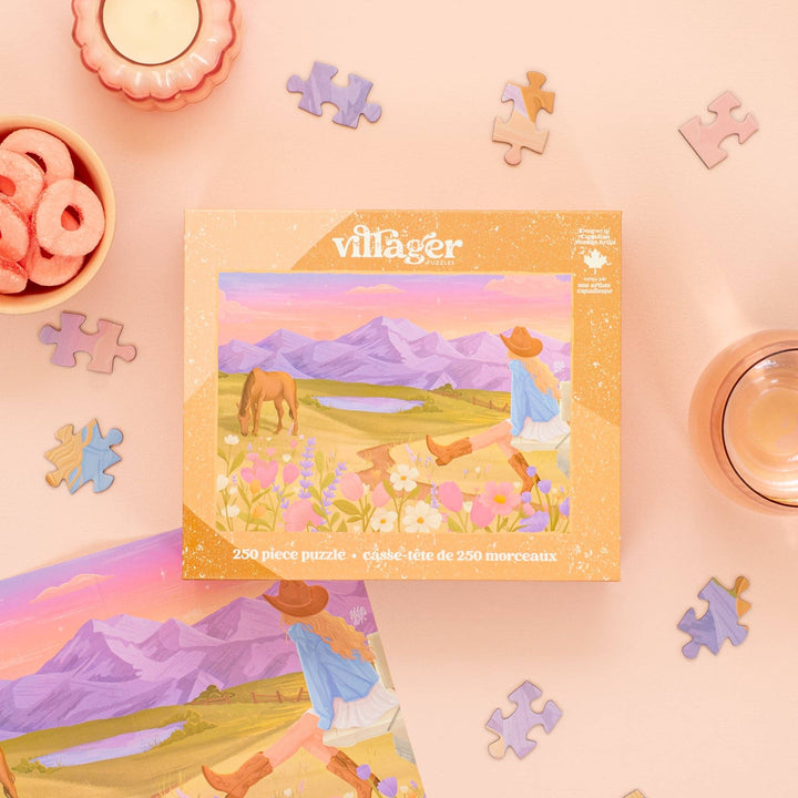 Villager Puzzles Rockies Meadow 250-piece puzzle depicting a scenic mountain landscape designed in Canada