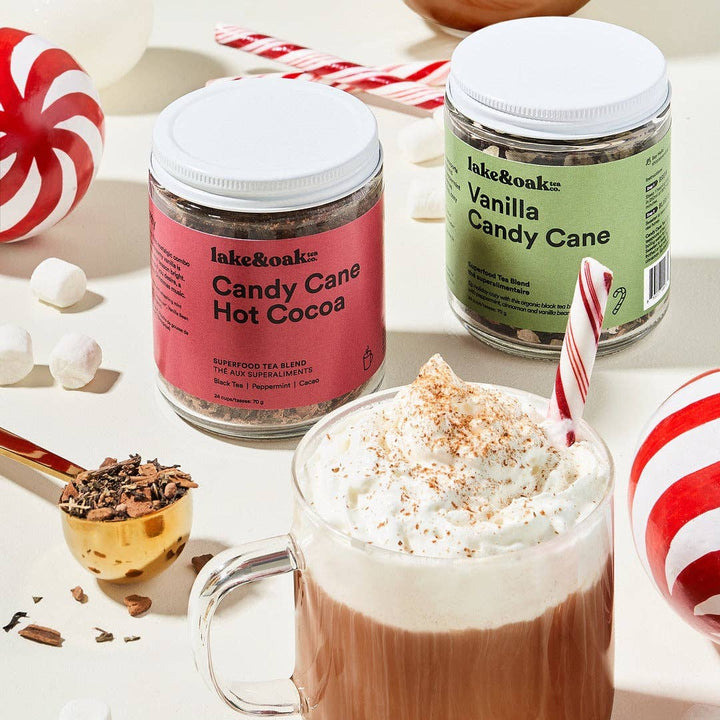 Lake &amp; Oak Tea Co. Candy Cane Hot Cocoa tea in a glass jar, showcasing loose-leaf tea for 24 cups of festive hot chocolate flavor.