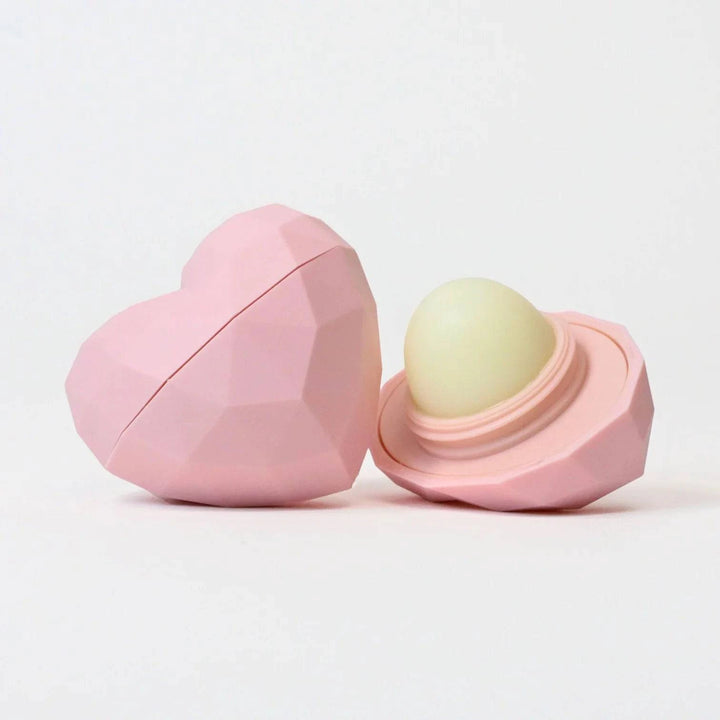 Pink Heart Lip Balm by Rebels Refinery, natural lip balm with a pink heart-shaped container, made in Canada.
