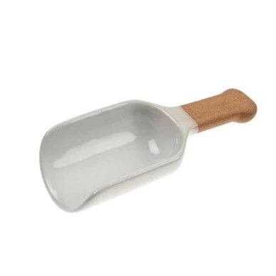 The handmade porcelain Potterie Scoops blend style and function. With unglazed bottoms, they are beautifully balanced and sit nicely on the counter, working well to scoop flour, sugar, and dried fruit.   PORCELAIN Microwave/Dishwasher Safe LENGTH: 2.25" WIDTH: 1.25" HEIGHT: 5"