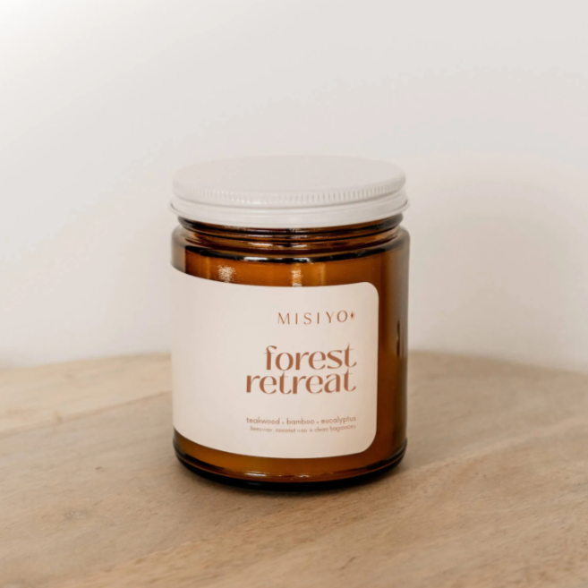 TEAKWOOD + BAMBOO + EUCALYPTUS // smells warm and lightly woodsy with notes of spiced musk. Creates a feeling of zen, both exotic and yet comfortingly familiar.  *new name, same 'Forest + Spice' smell*  45-50 hour burn time Gives back 3 months of health insurance to someone in Rwanda Handcrafted with Canadian beeswax, pure coconut wax, natural cotton wick, phthalate-free fragrances + essential oils