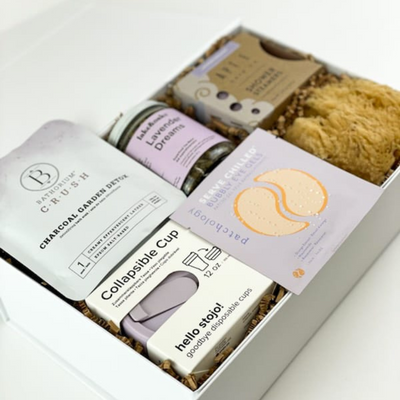 This luxury gift box was curated for unwinding and clearing your mind, a winning combination to create the perfect slumber.  GIFT CONTENTS:  Apt 6 Lavender Shower Steamers Lake & Oak Lavender Dreams Tea Patchology Serve Chilled Bubbly Eye Patches Stojo Collapsible Lilac Cup Bathorium Charcoal Garden Detox Natural Sea Sponge
