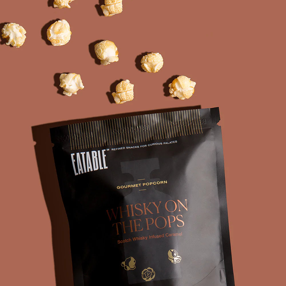 Whiskey - 50 g Bag  SMOKY. WISE. DAPPER.  Air-popped whole-grain popcorn coated in a luxuriously smooth and crunchy Scotch Whisky-infused caramel. Double-baked to deliver a perfect, satisfying crunch.   Artisan hand-crafted in small batches from our Toronto facility.