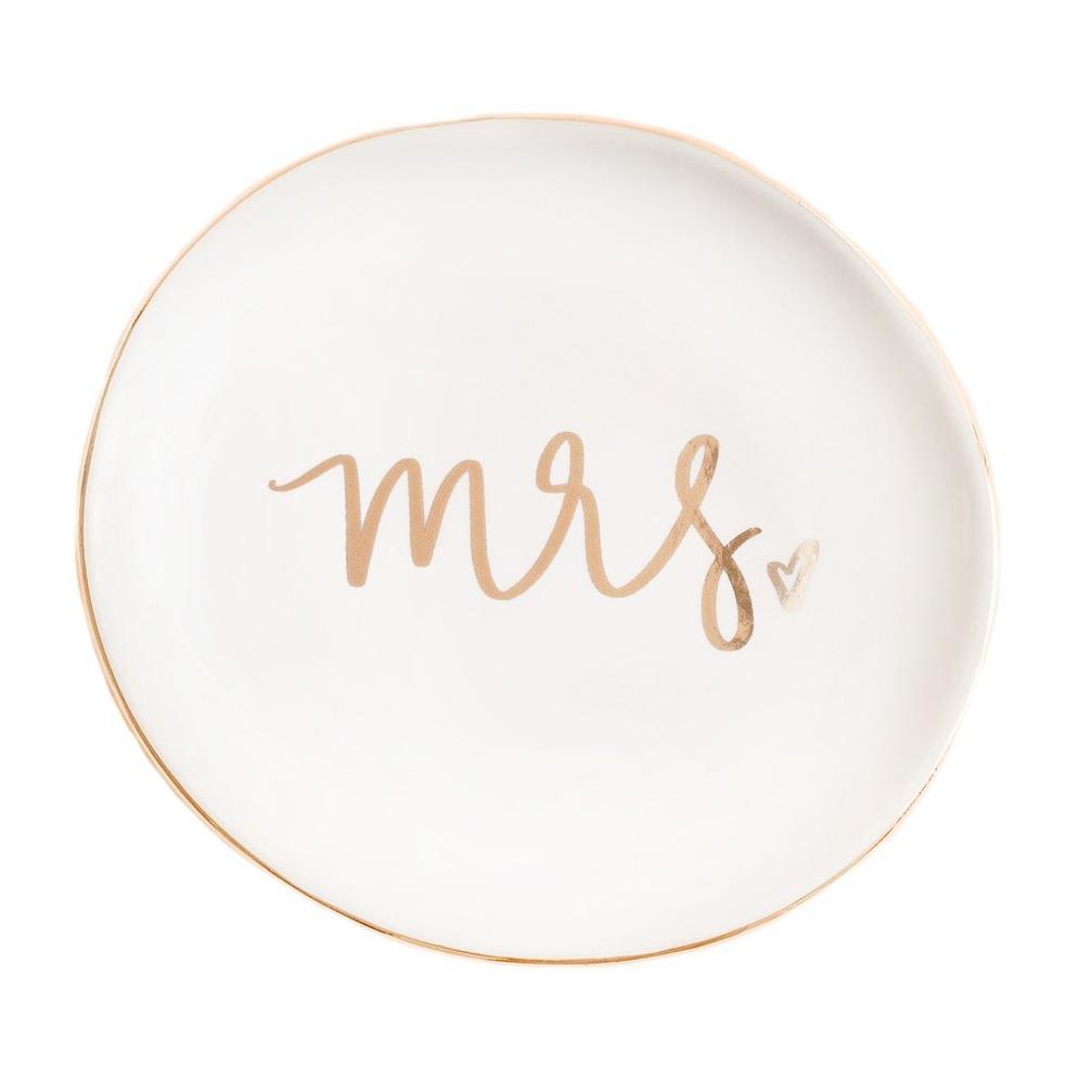 Every bride & bride-to-be will swoon over their new Mrs. Jewelry Dish! The beautiful gold foil trinket tray is perfect for placing your wedding ring or earrings to keep them in a safe place. The gold foil details add a touch of chic glam, perfect for your office or bedroom! This beautiful tray also makes a great addition to our custom Engagement and Bridal gift boxes.  Recommended Occasions: Engagement Gift Box, Wedding Gift Box, Anniversary Gift Box, Congratulations Gift Box Gift Box Canada