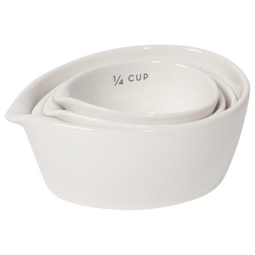 This set of four stoneware measuring cups will add a touch of charm to your kitchen. We can't promise they will elevate your cakes to Bake Off standards, but we can promise that they will look gorgeous on a shelf!  Gift Box Recommendations: Housewarming Gift Box, Housewarming Gift, Hostess Gift, New Home Gift